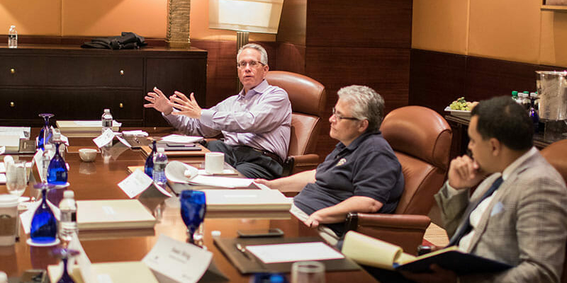 Presidents talking at a table