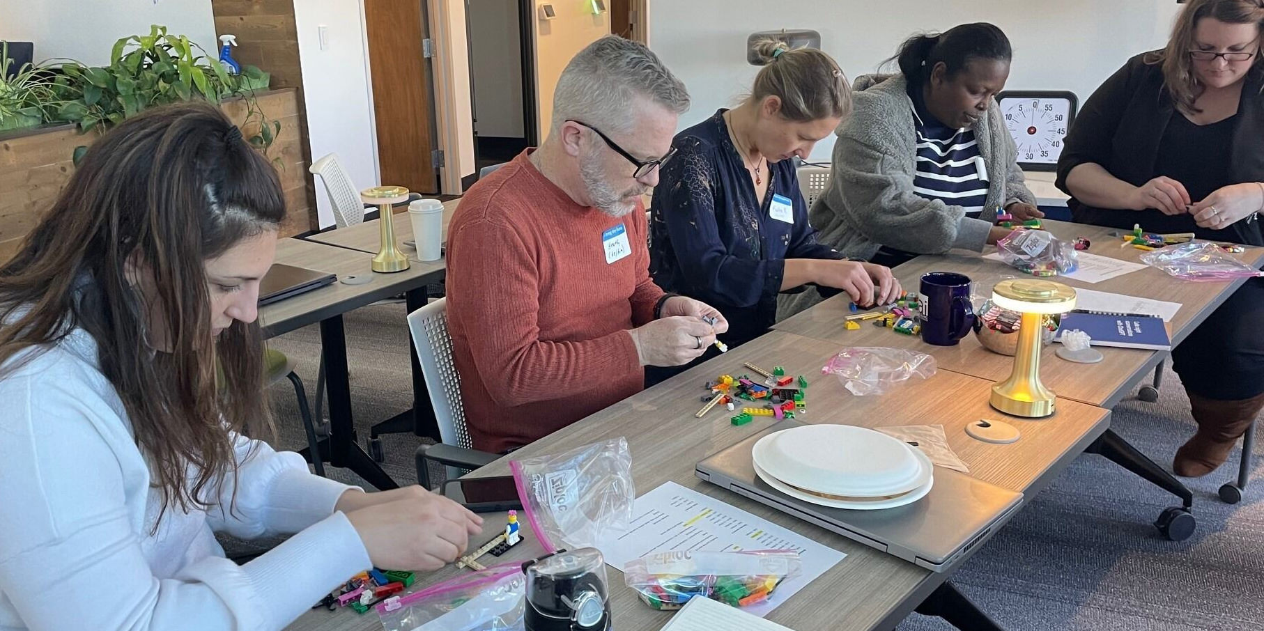 People doing an activity at an Academic Impressions conference