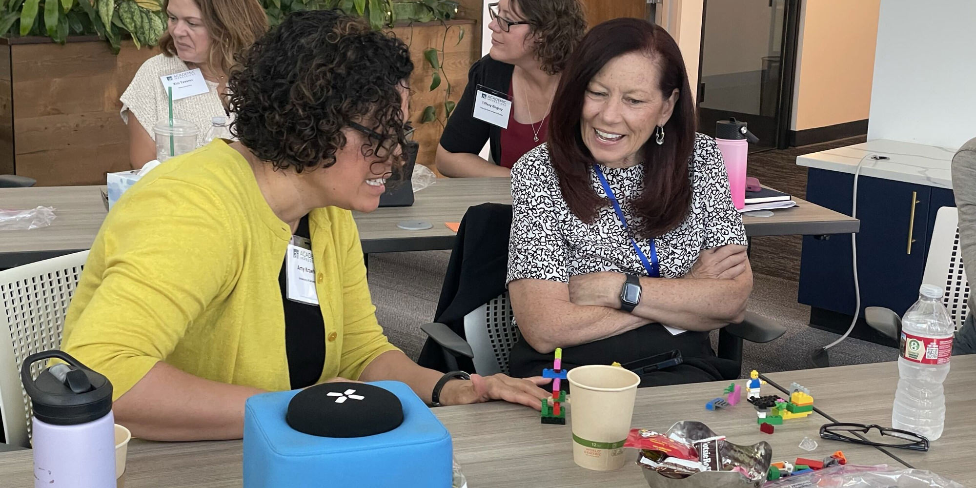 Group of attendees doing an activity at an Academic Impressions conference