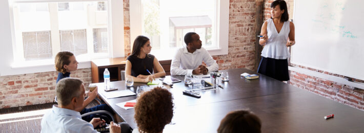 Leader business woman leading a meeting