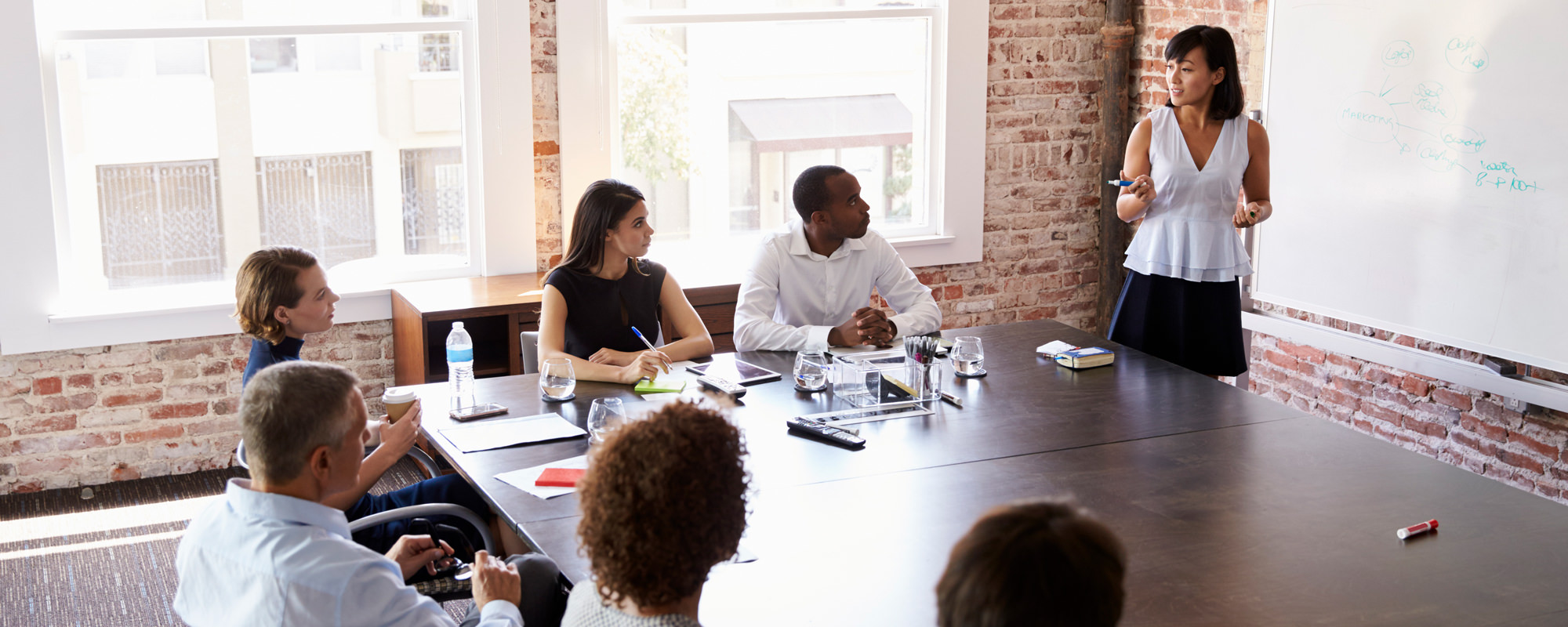 Leader business woman leading a meeting