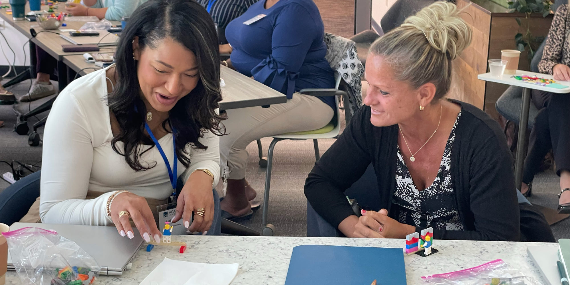 Group of attendees doing an activity at an Academic Impressions conference